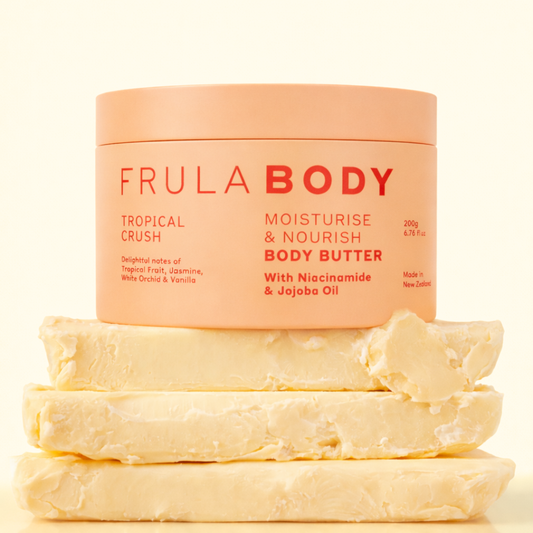 Frula Body moisturizing body butter with tropical crush scent on a beige background