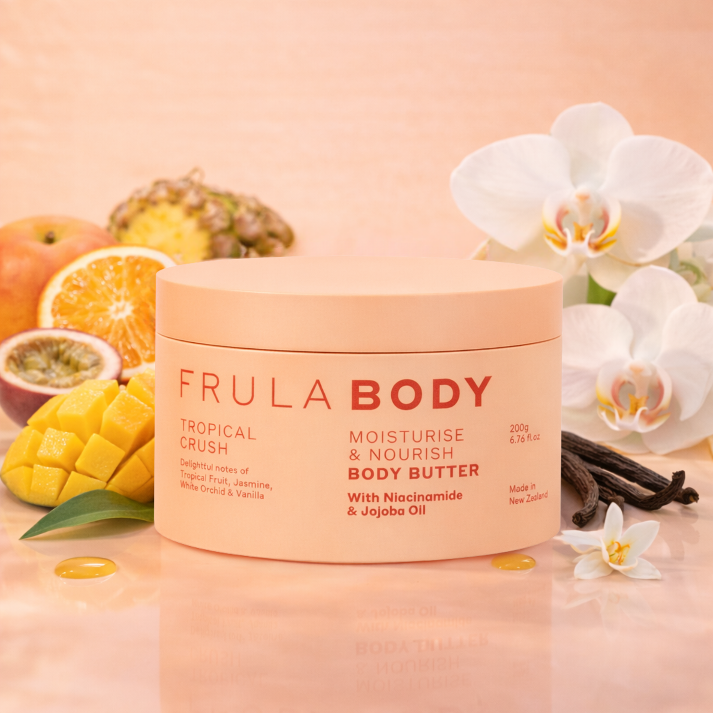 Frula Body tropical crush body butter with fruits and flowers on a peach background